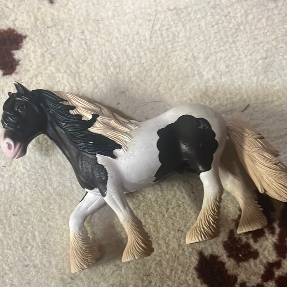Brown and White Horse Figurine with Toy Kids